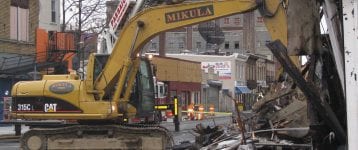 Excavator working on Mikula demolition job