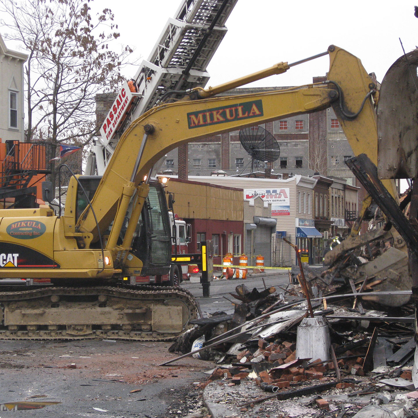 Excavator working on Mikula demolition job