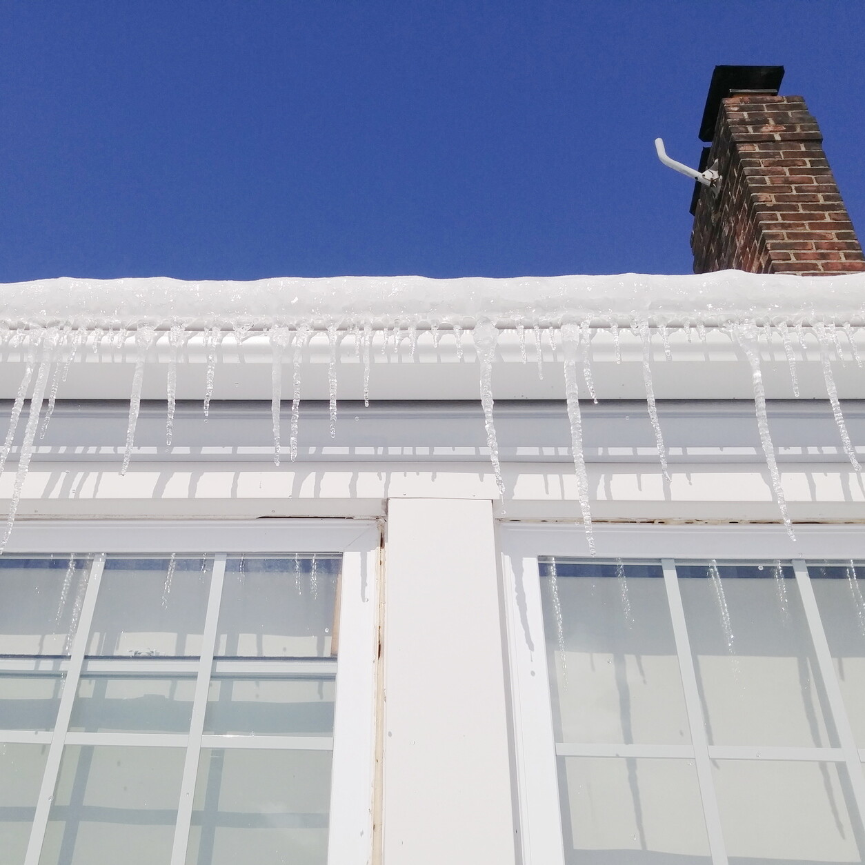 icicles on drain in winter