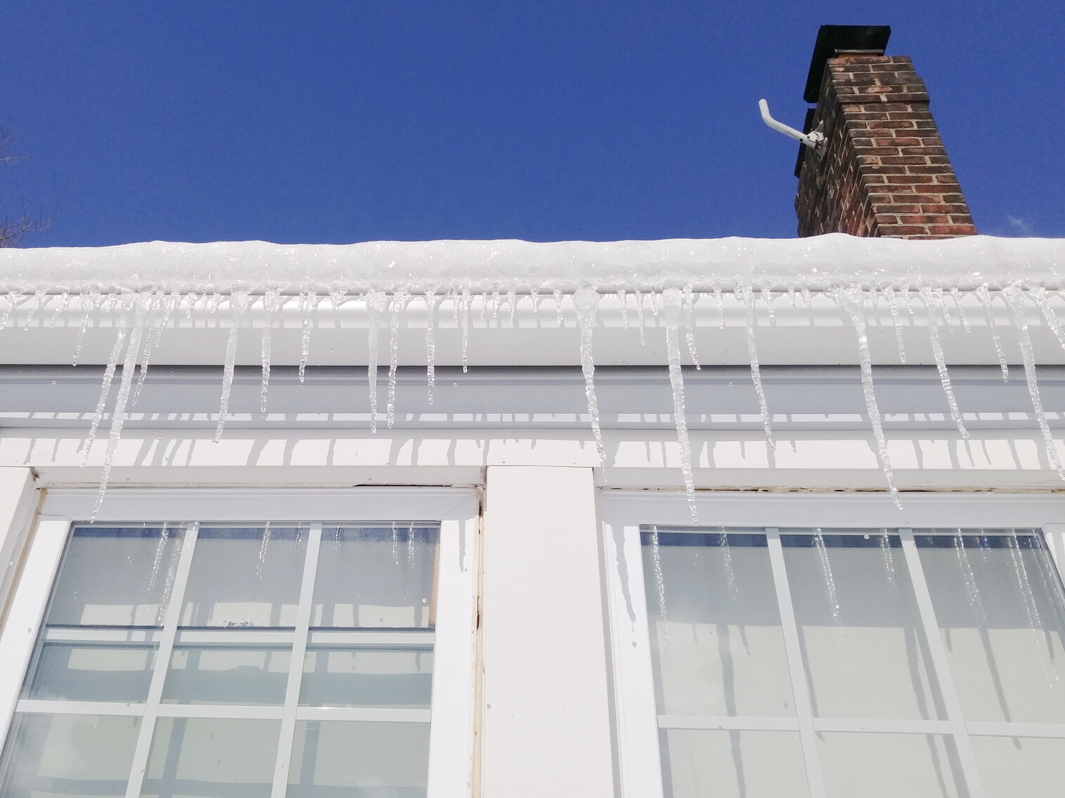 icicles on drain in winter