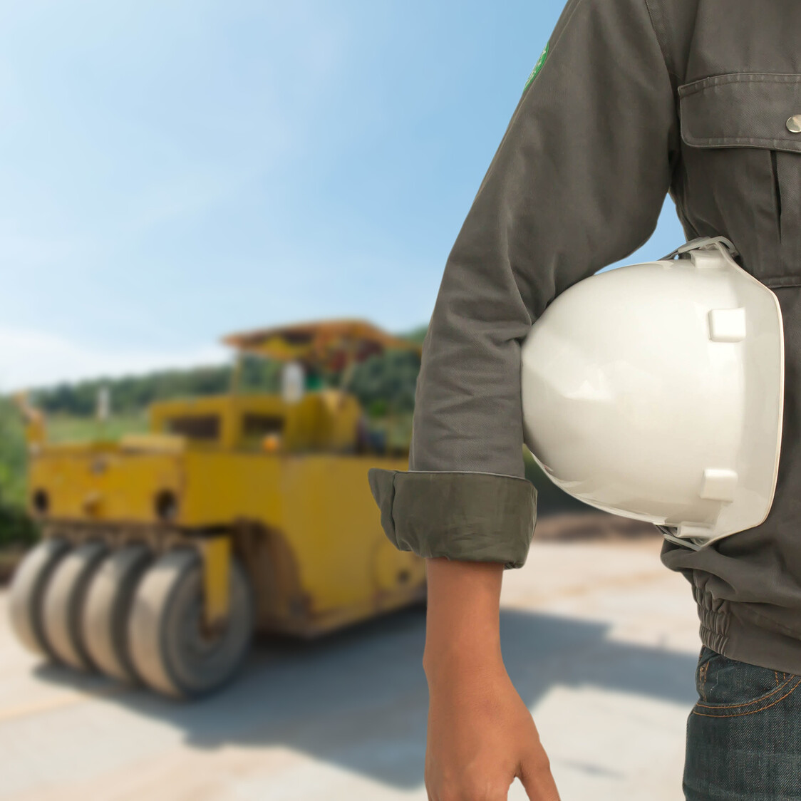 construction worker holding helmet