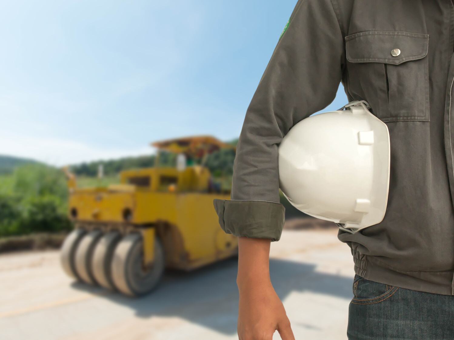 construction worker holding helmet