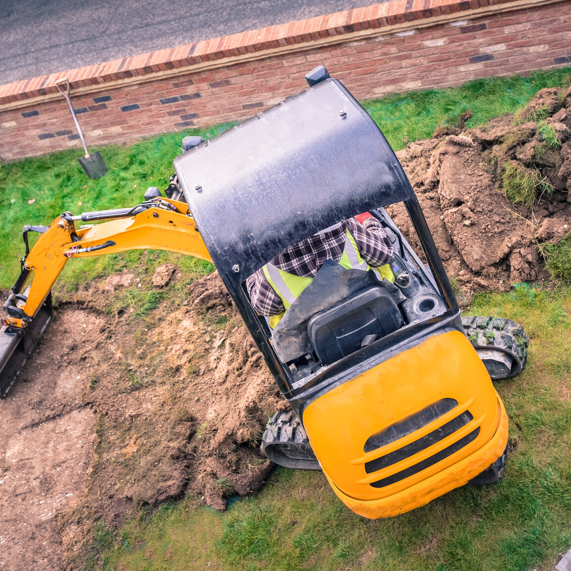 Excavation equipment in residential yard