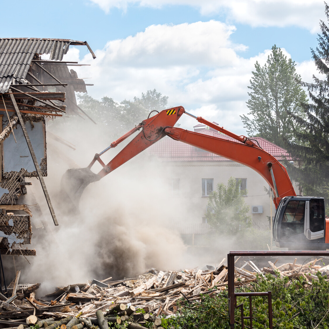 excavator working at the residential demolition of a home mikula contracting