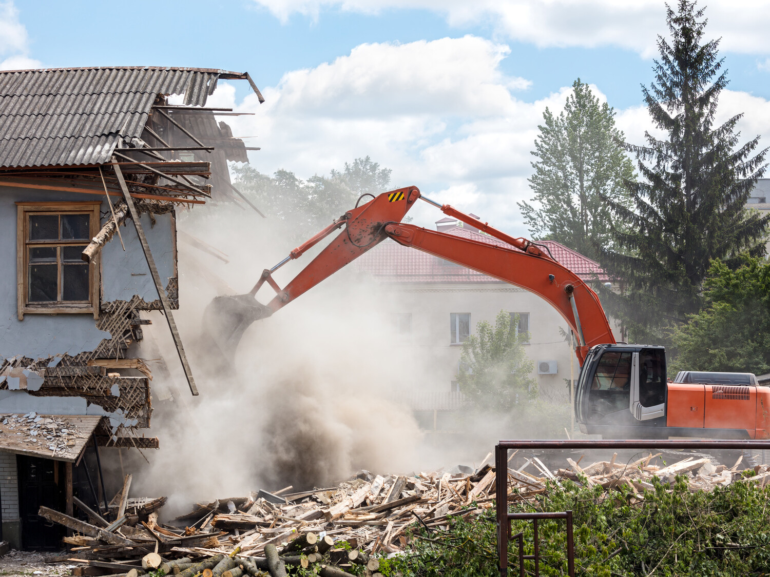 excavator working at the residential demolition of a home mikula contracting