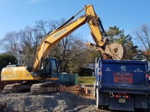 excavation equipment digging at jobsite