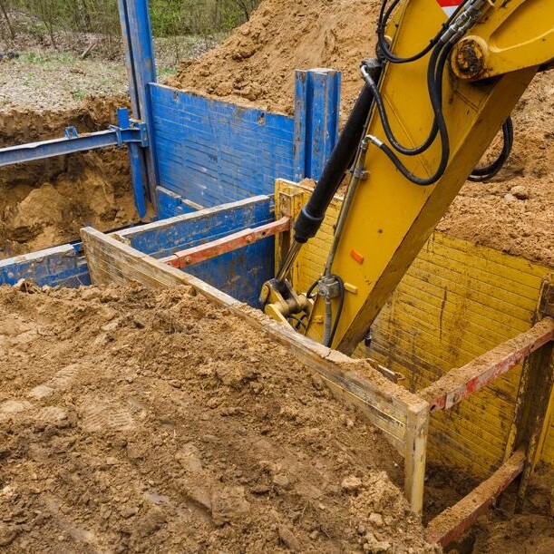 excavation machine digging at jobsite
