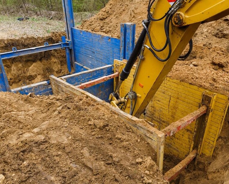 excavation machine digging at jobsite