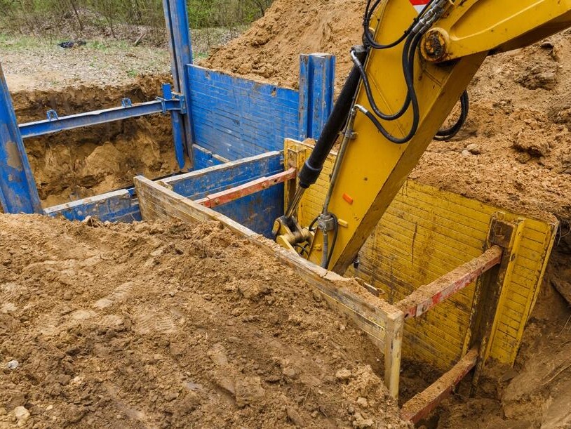 excavation machine digging at jobsite