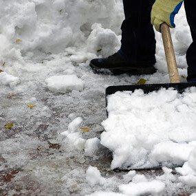 Person shoveling snow