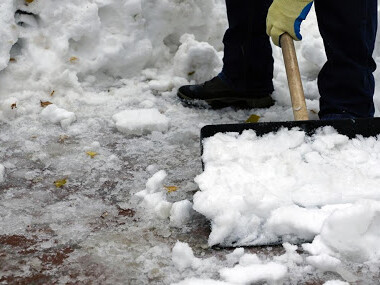 Person shoveling snow