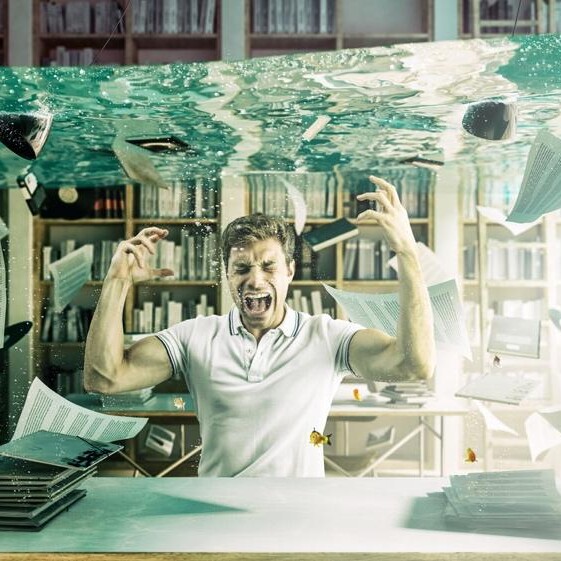 man screaming in flooding library