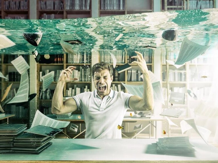 man screaming in flooding library