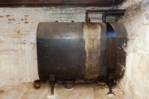old oil tank in residential home basement