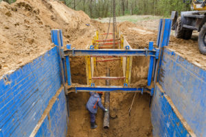 trench shoring job being done by excavation firm
