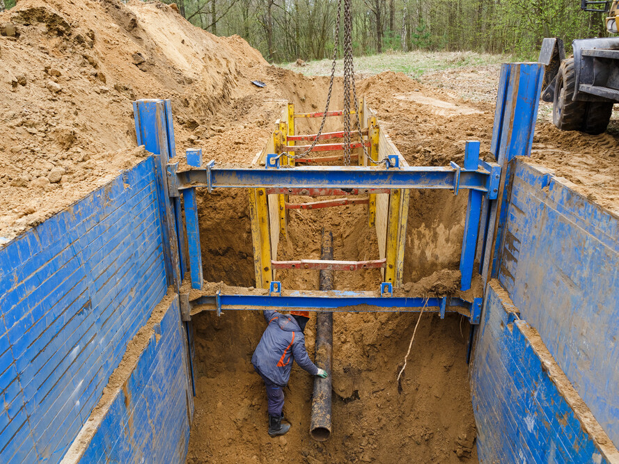 trench shoring job being done by excavation firm