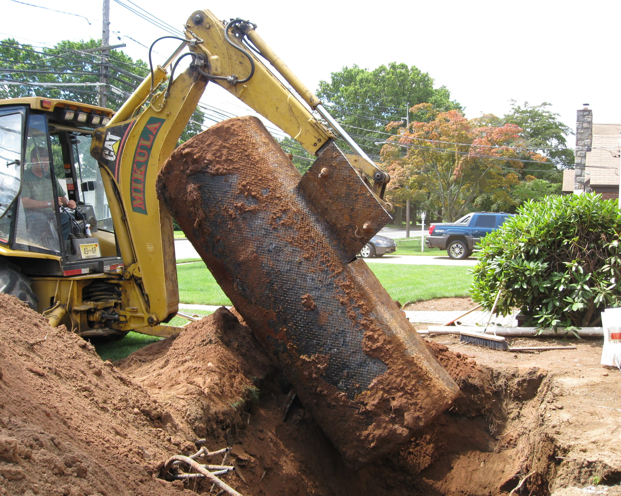 The team at Mikula Contracting has the tools, expertise, and experience to remove and replace your underground oil tank.