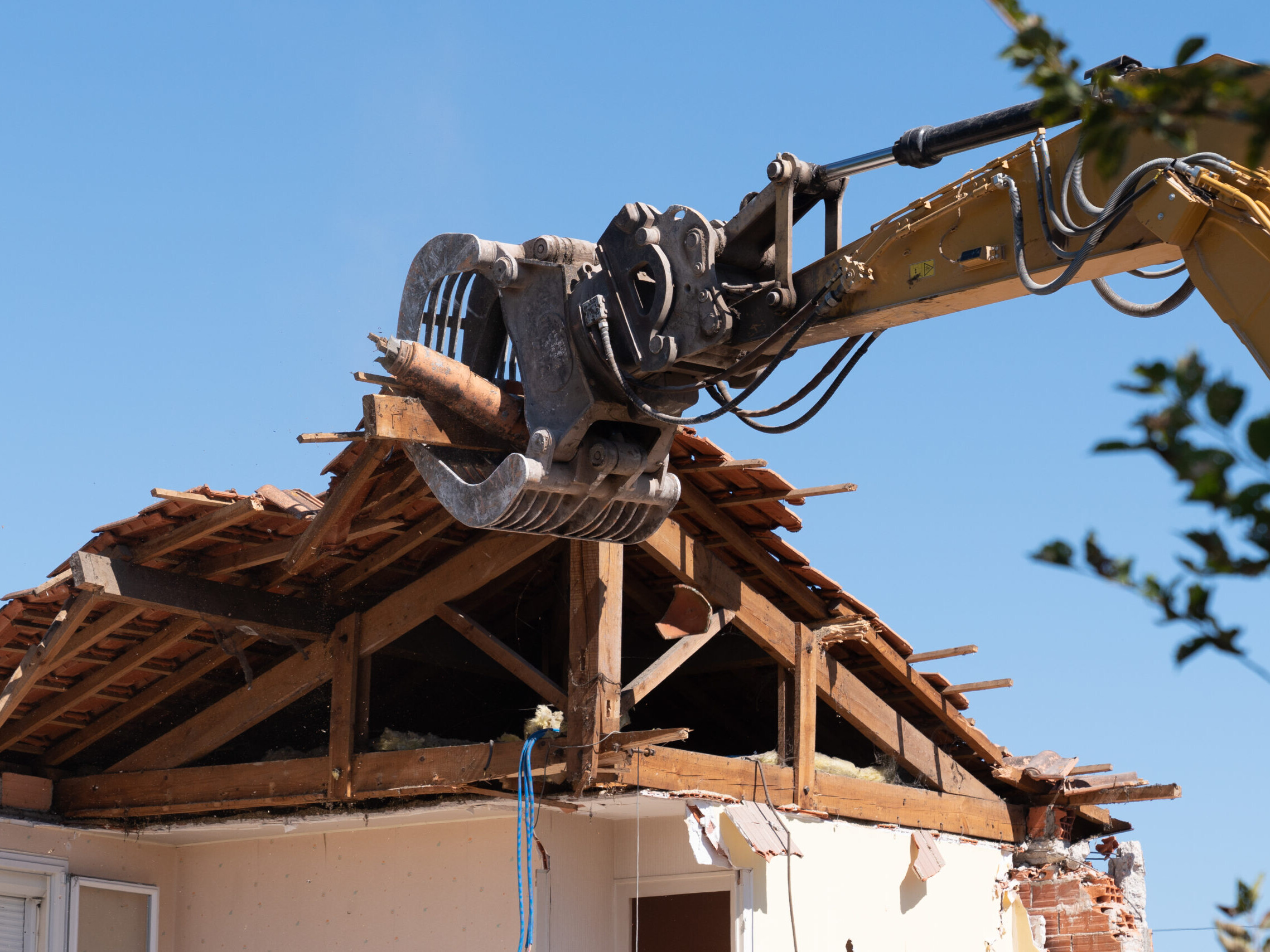 excavation contractors tear down home
