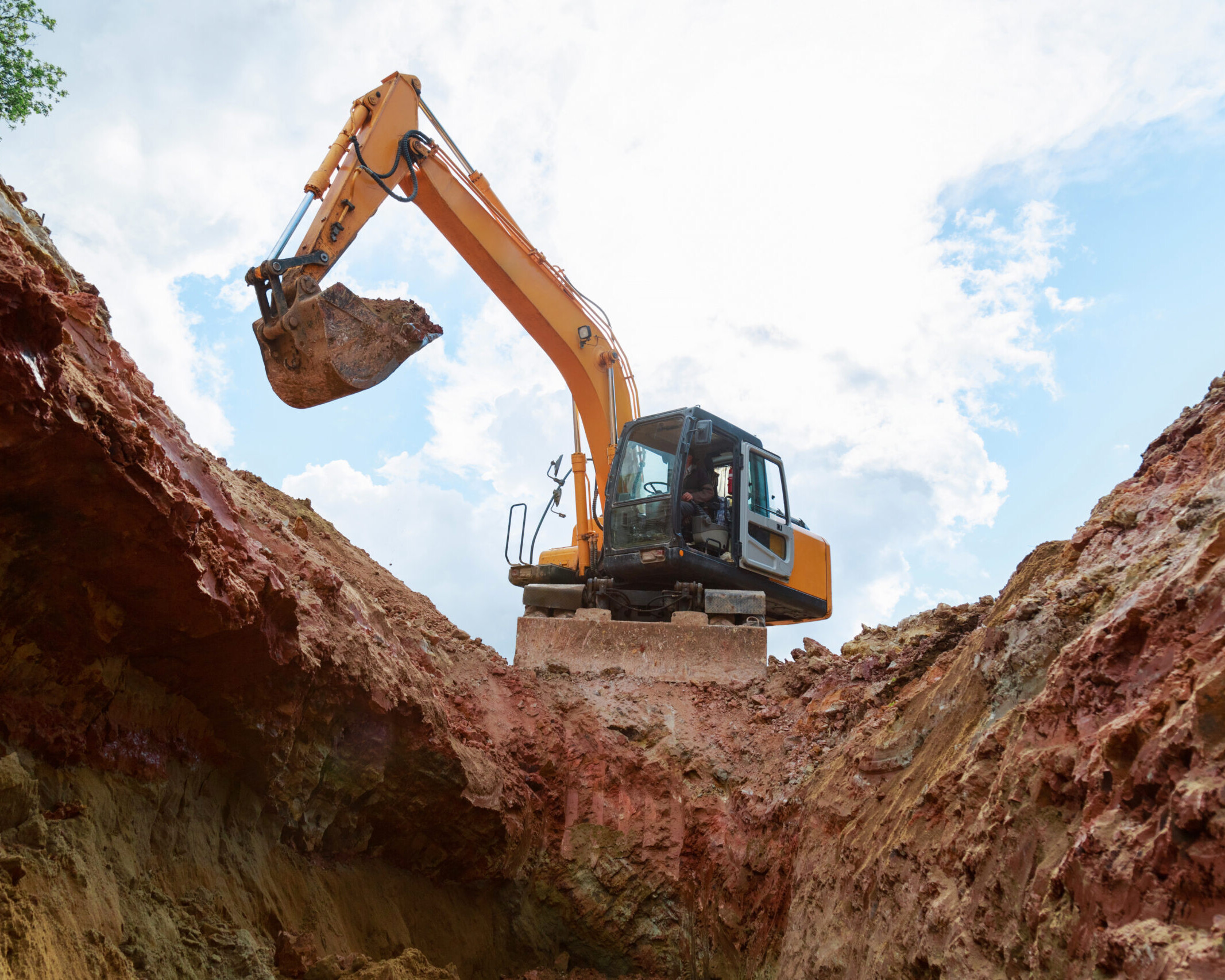 Excavator Digging Into A Construction Site