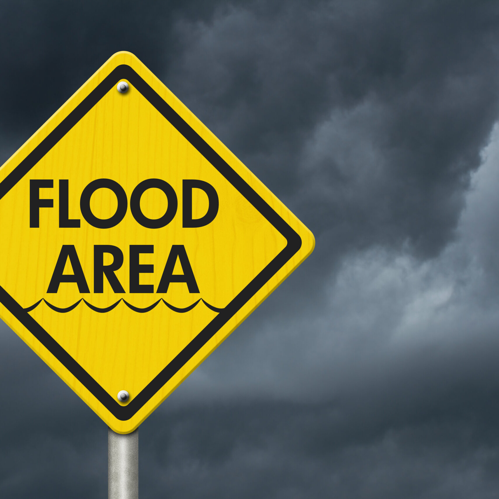 Yellow Warning Flood Area Highway Road Sign, Red, Yellow Warning Highway Sign with words Flood Area with stormy sky background