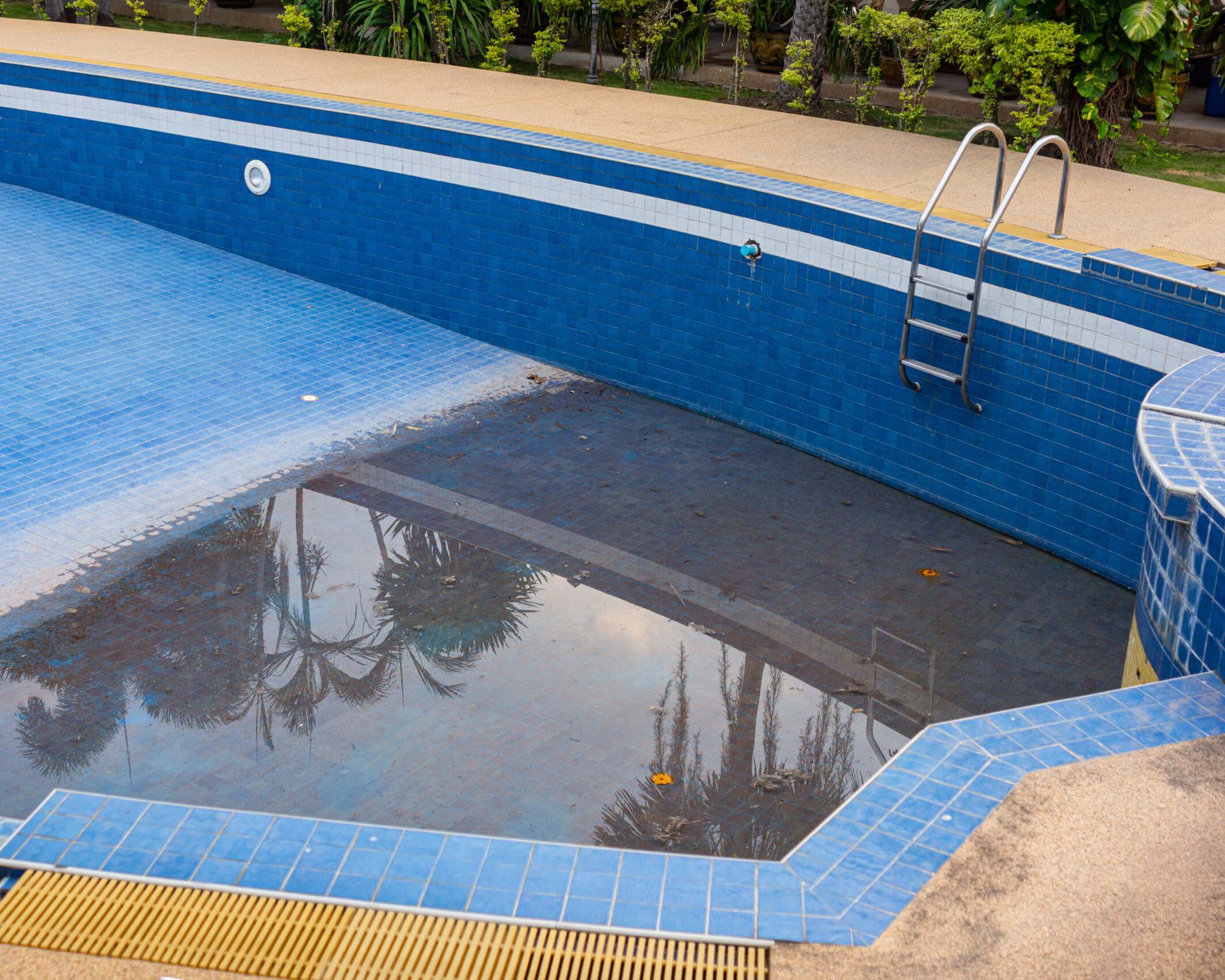 old and abandoned swimming pool ready for removal
