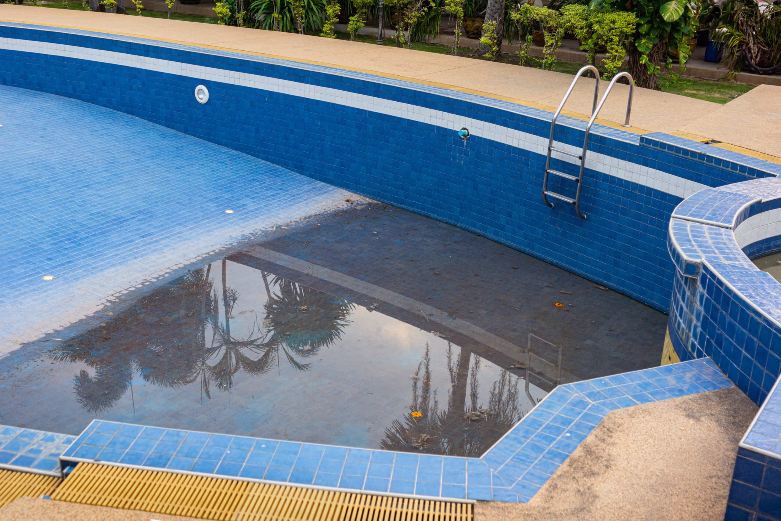 old and abandoned swimming pool ready for removal